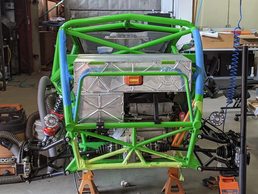 Ariel Nomad mid-assembly - 800VDC Cascadia Motion battery pack installed in the spaceframe with CNC decorative faceplates visible